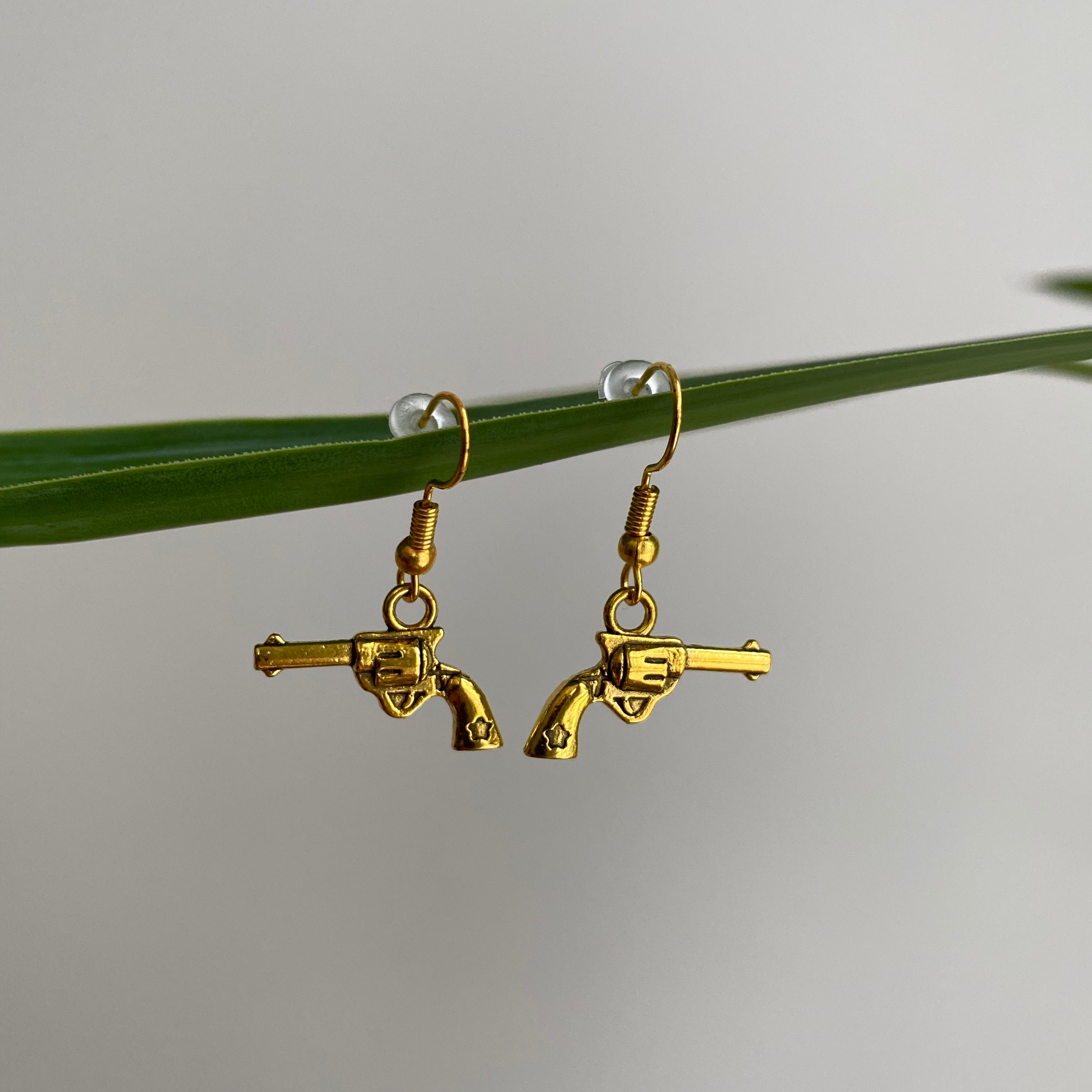 Gold Western Guns Dangle Earrings