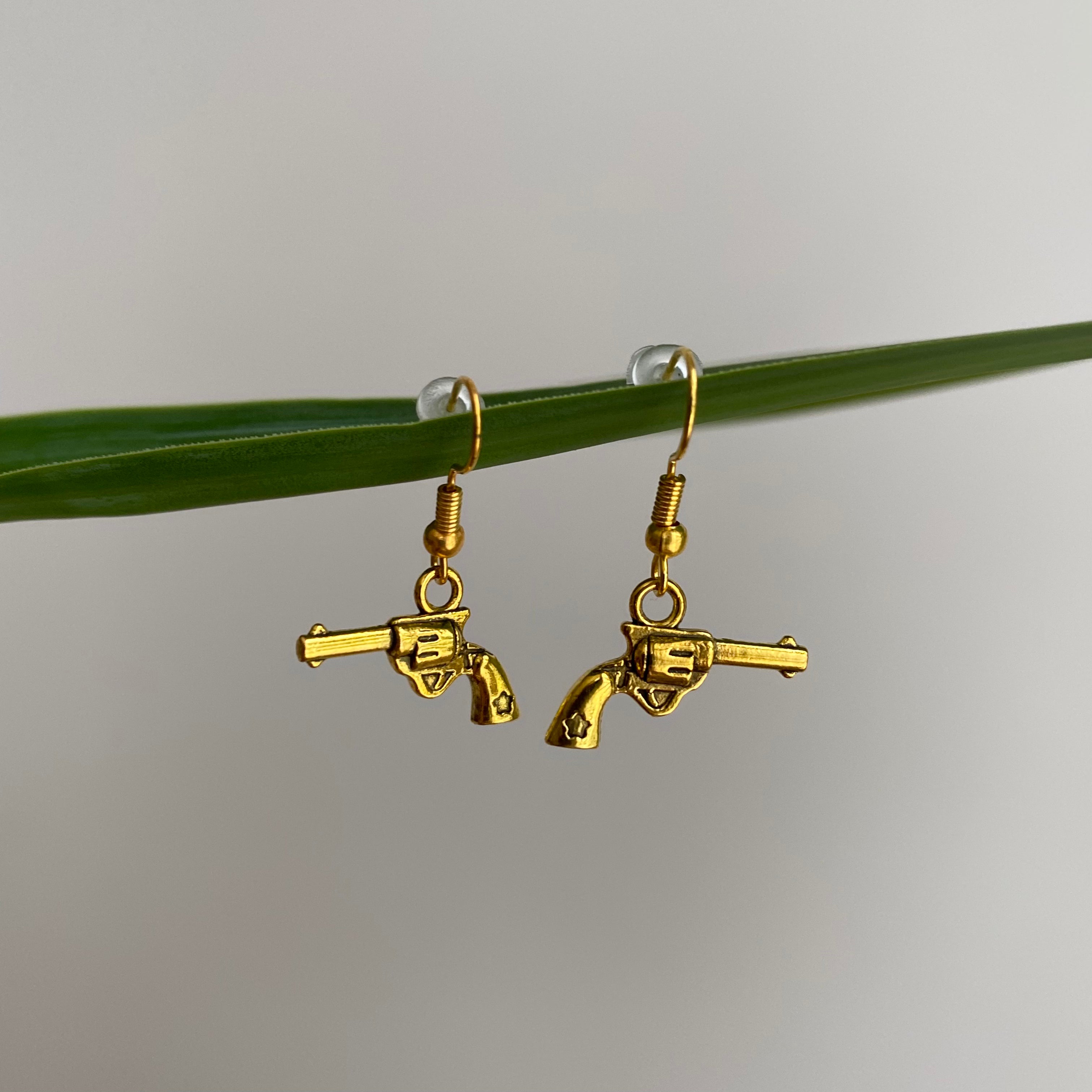 Gold Western Guns Dangle Earrings