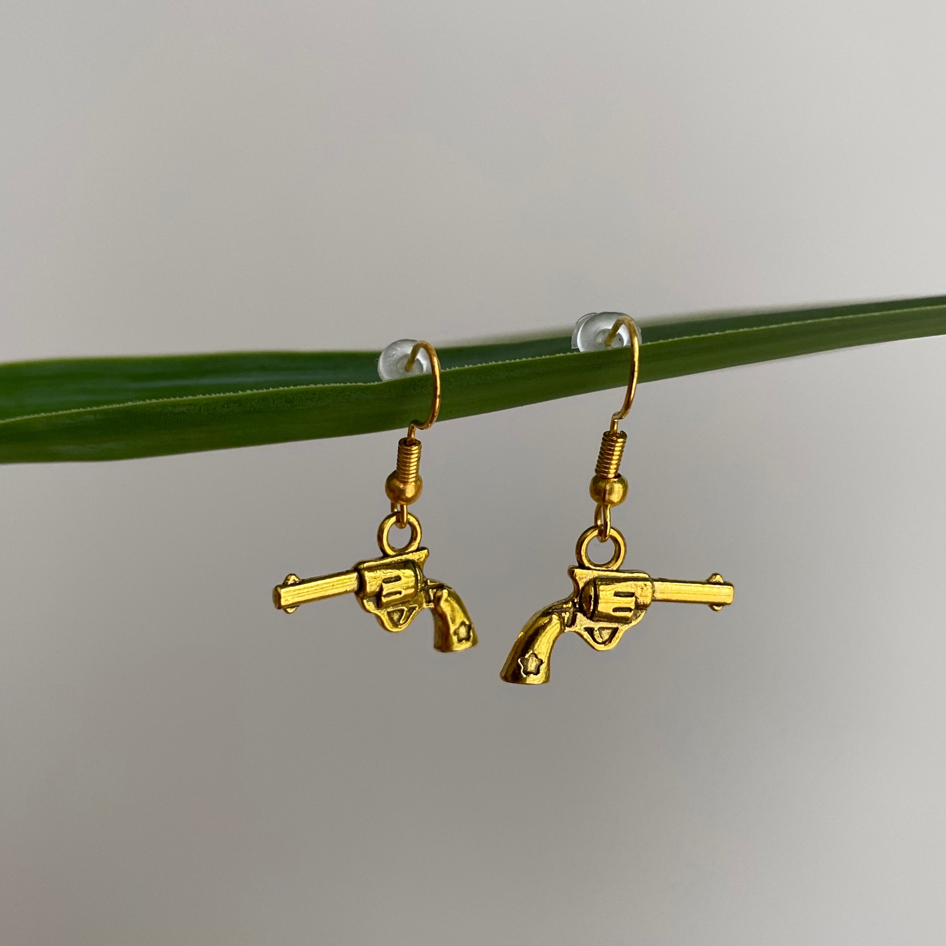 Gold Western Guns Dangle Earrings