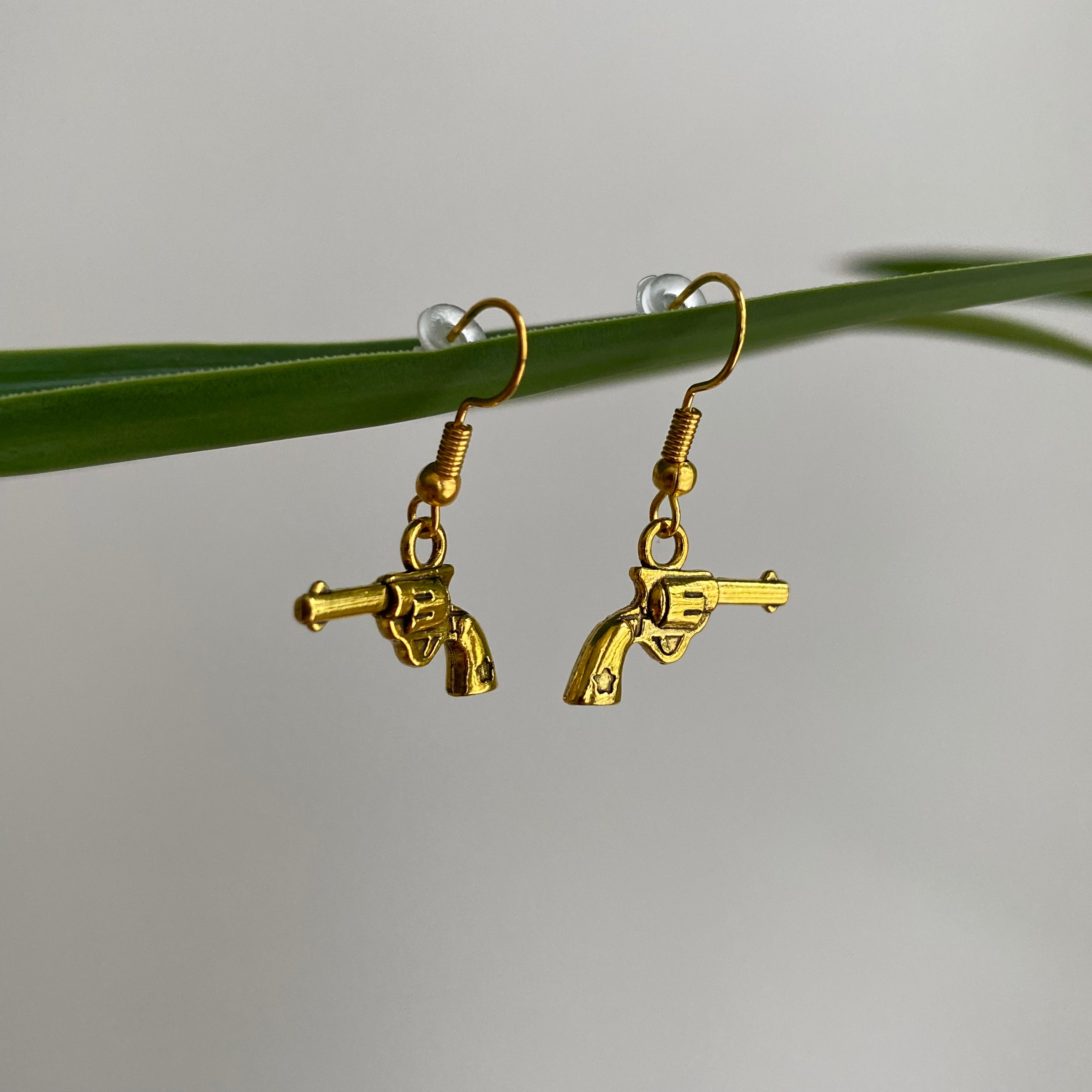 Gold Western Guns Dangle Earrings