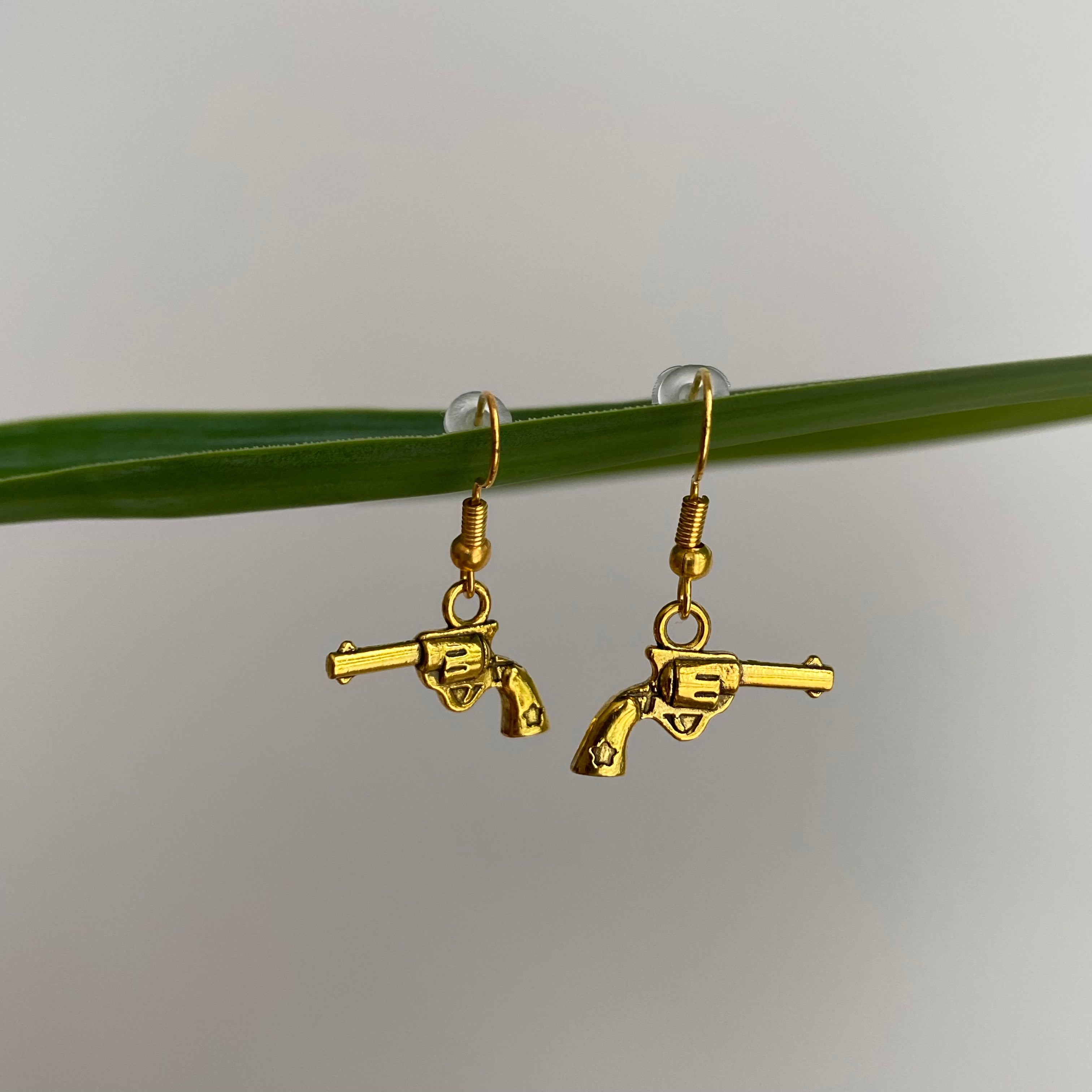 Gold Western Guns Dangle Earrings