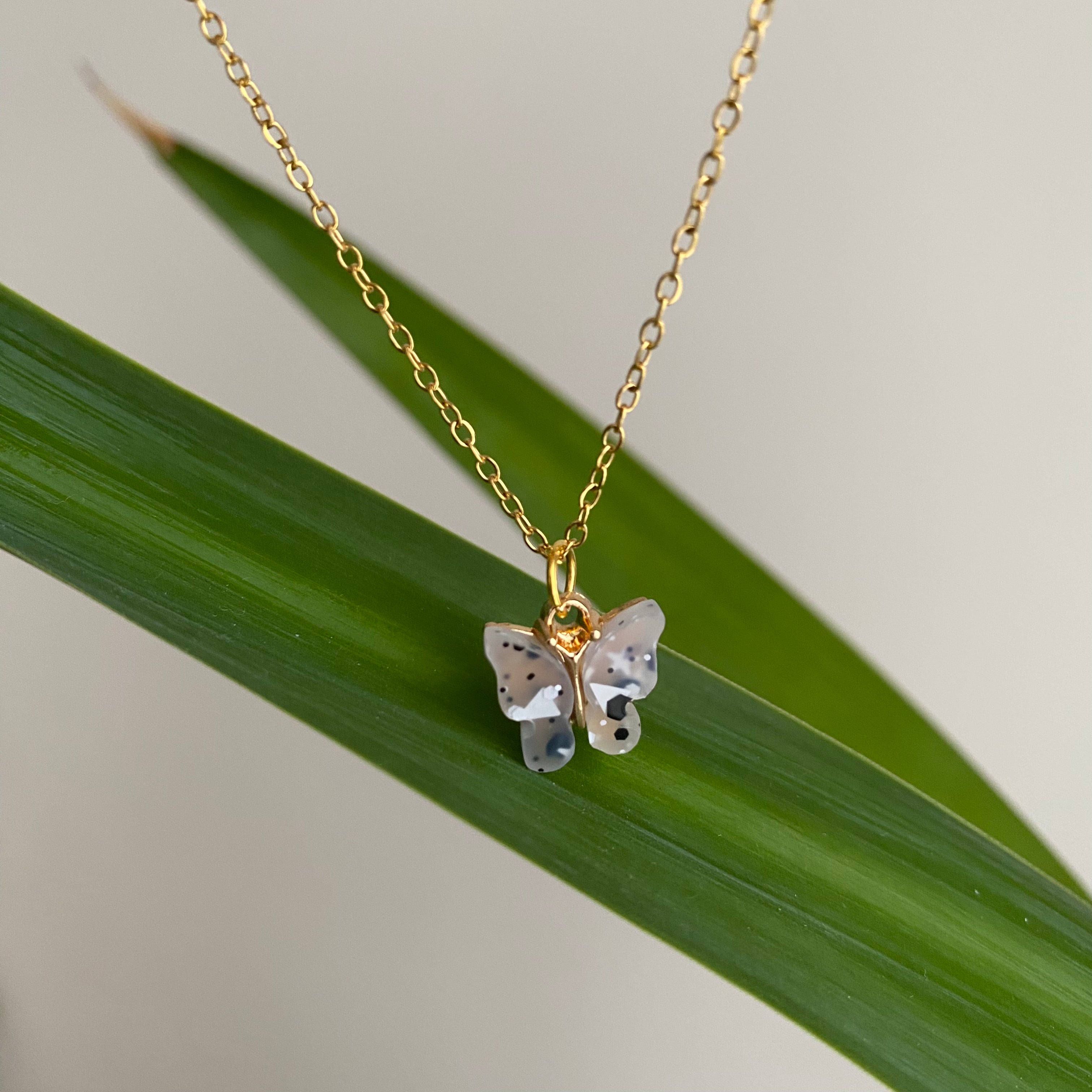 Grey Splatter Butterfly Necklace