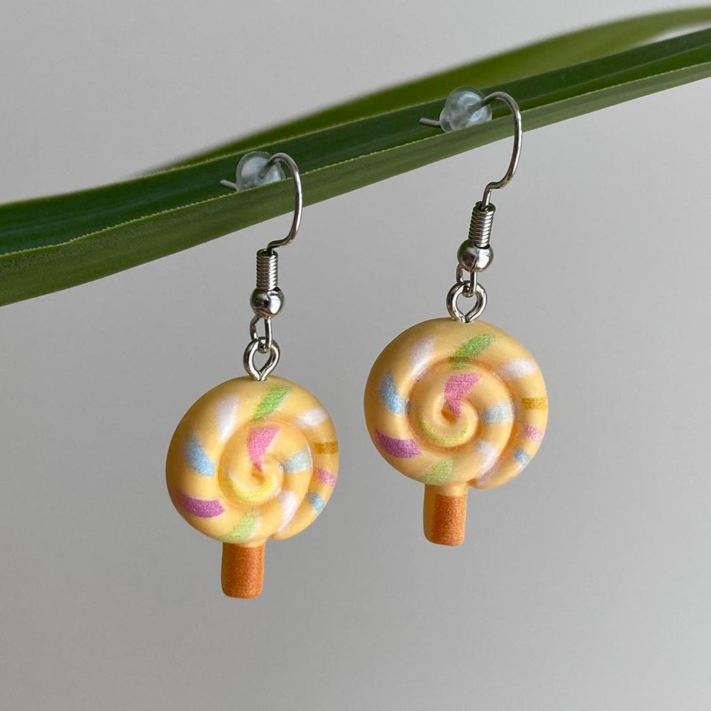 Orange Swirly Lollipop Dangle Earrings With Silver