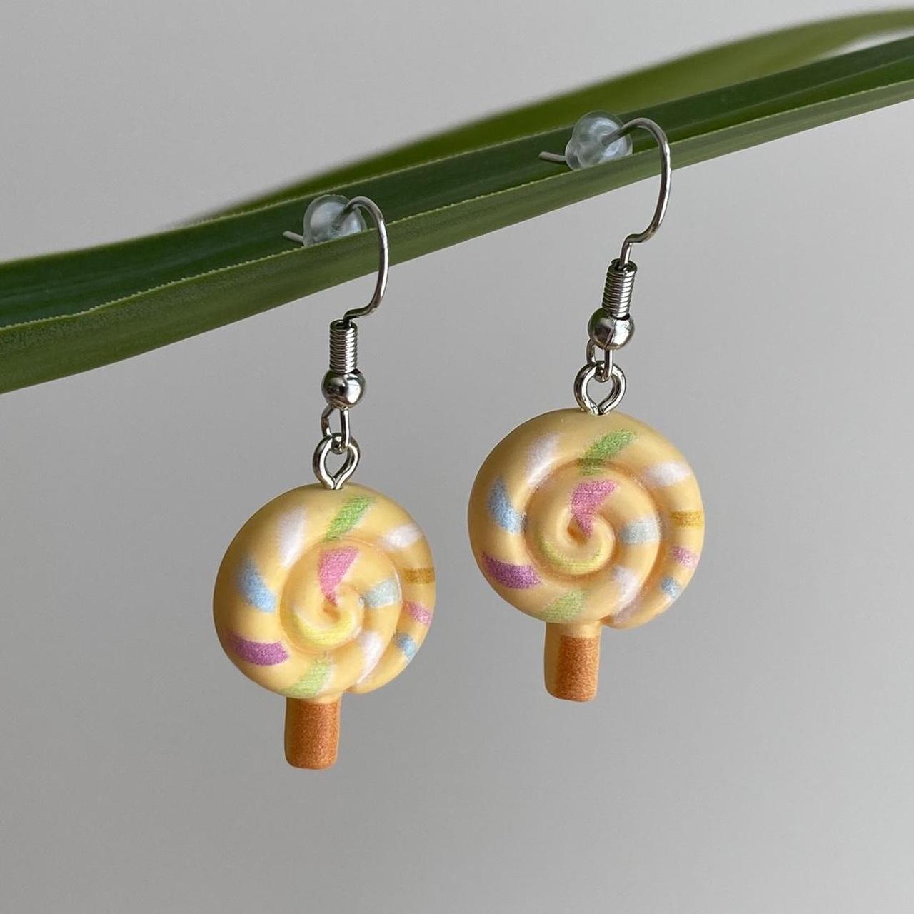 Orange Swirly Lollipop Dangle Earrings With Silver