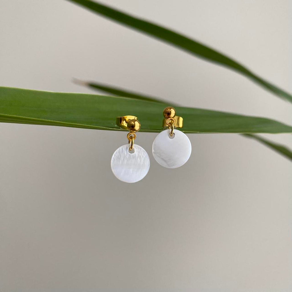 White Circle Shell Gold Dangle Stud Earrings Hand - Image 2