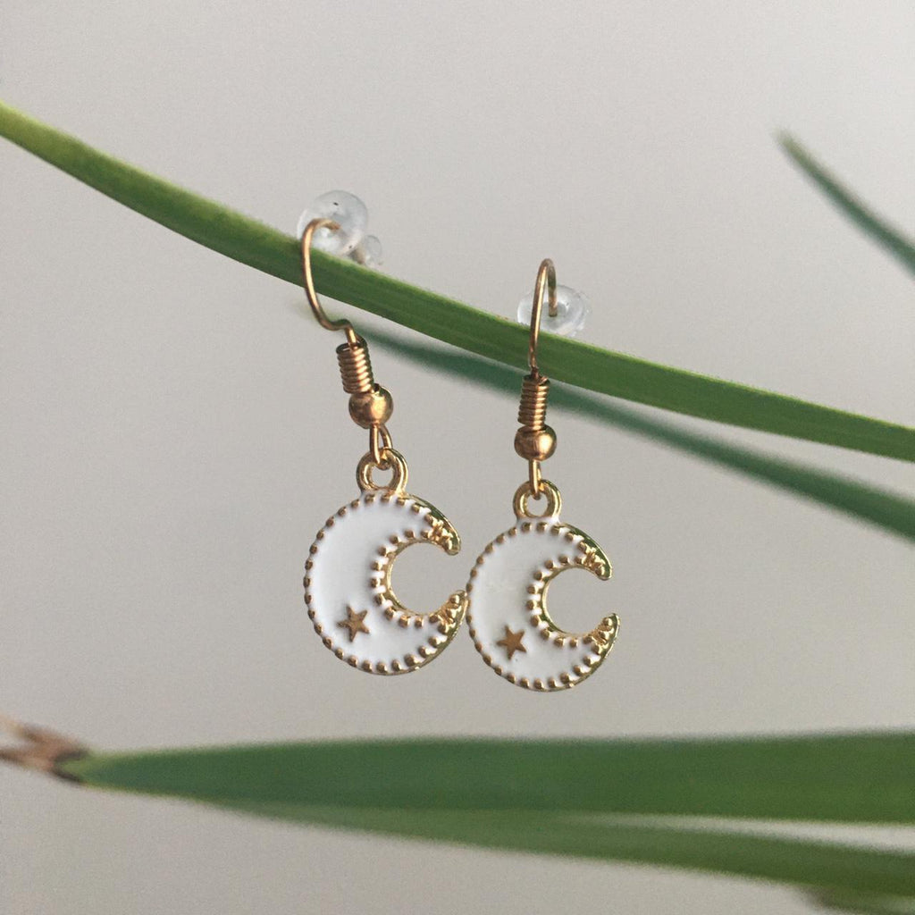 White Moon Dangle Earrings With Gold Star Accent