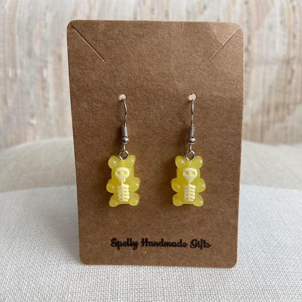 Yellow Skeletal Gummy Bear Dangle Earrings Hand - Image 5