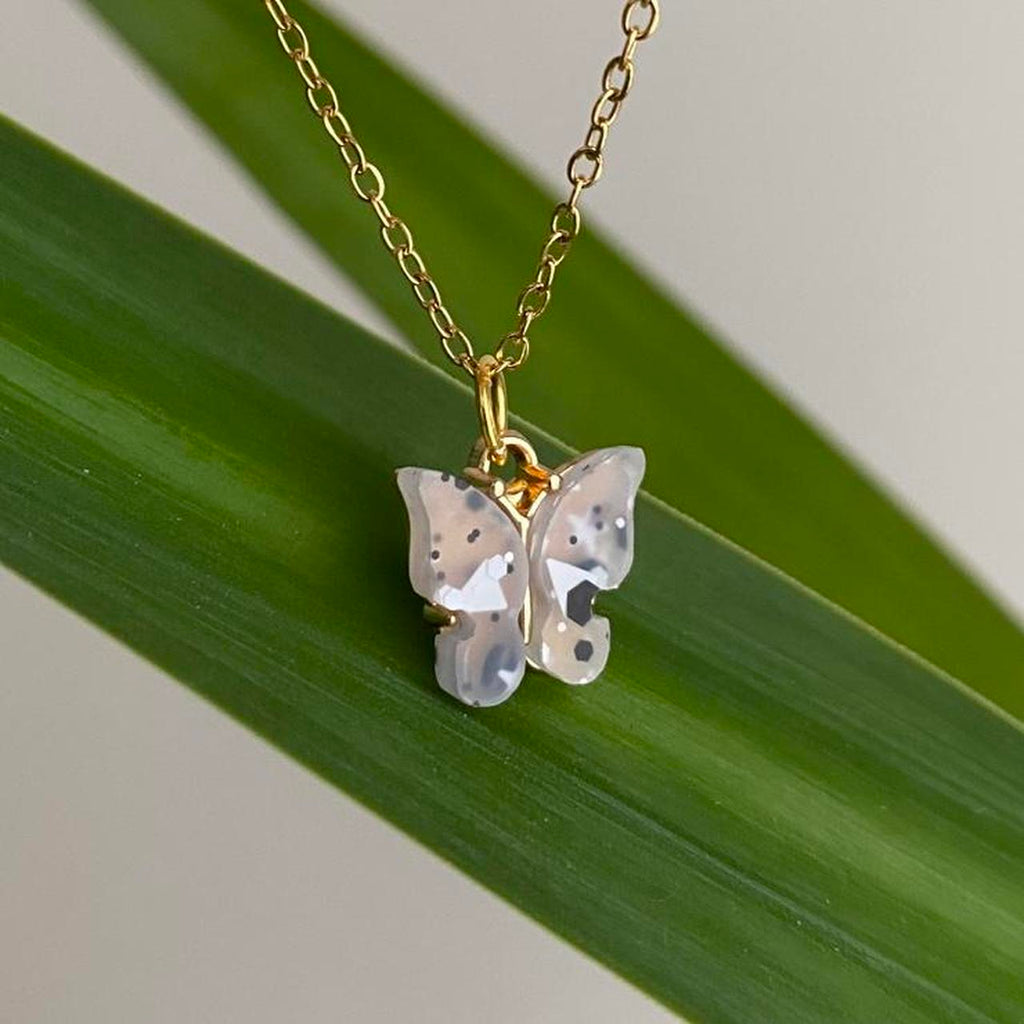 White And Black Speckled Clear Butterfly Pendant