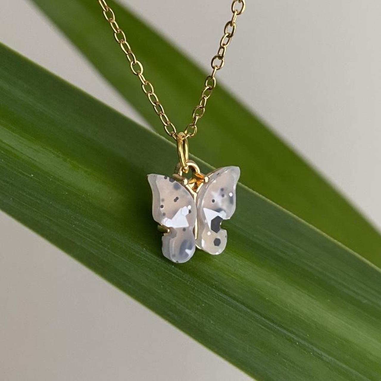 White And Black Speckled Clear Butterfly Pendant