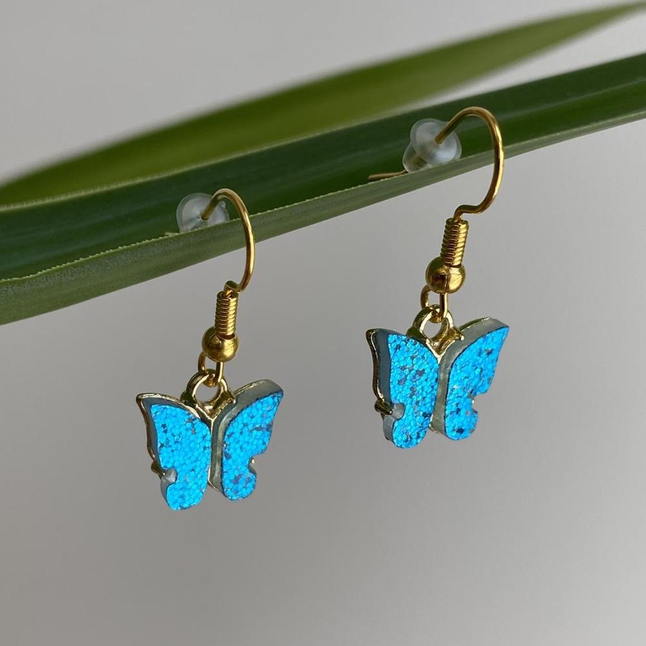 Blue Sparkle Butterfly Dangle Earrings With Gold - Image 2