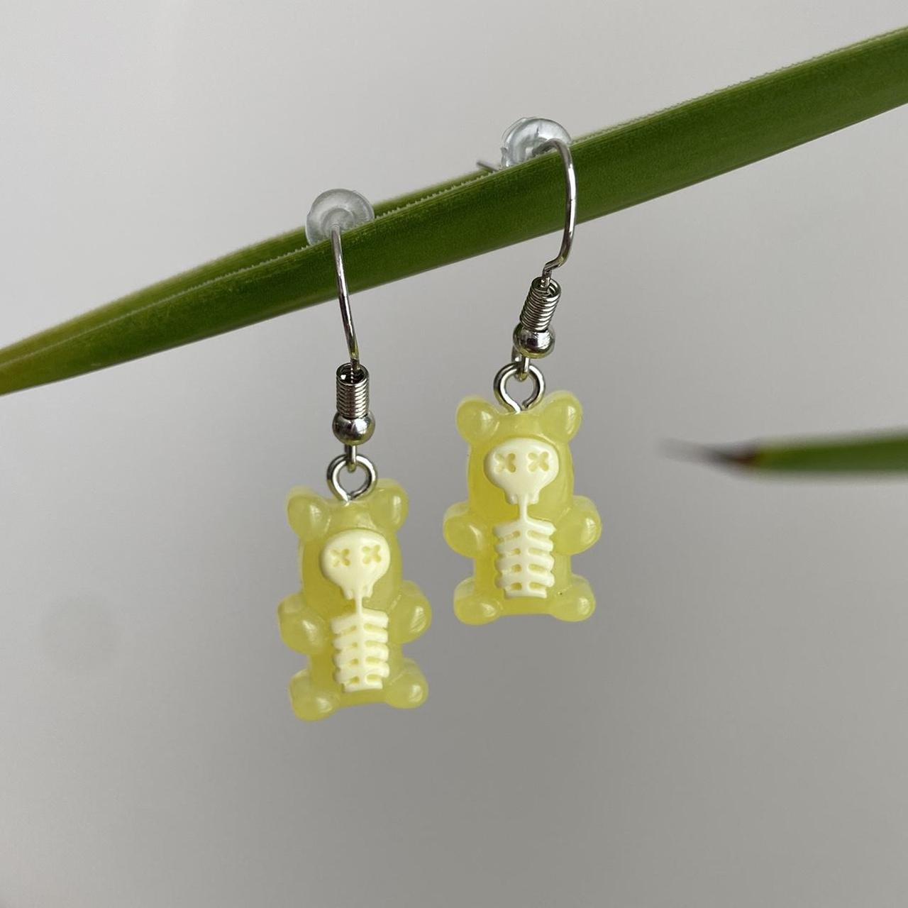 Yellow Skeletal Gummy Bear Dangle Earrings Hand