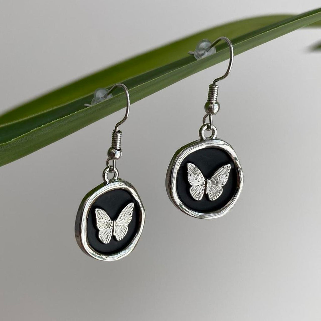 Black And Silver Stamped Wax Seal Style Butterfly