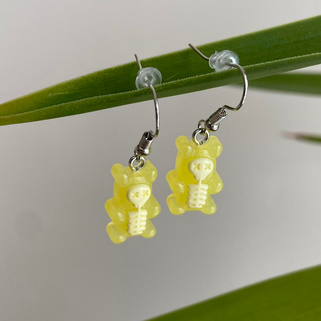Yellow Skeletal Gummy Bear Dangle Earrings Hand - Image 3