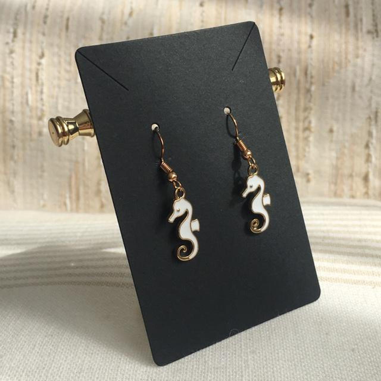 White Seahorse Dangle Earrings With Gold Accents - Image 2