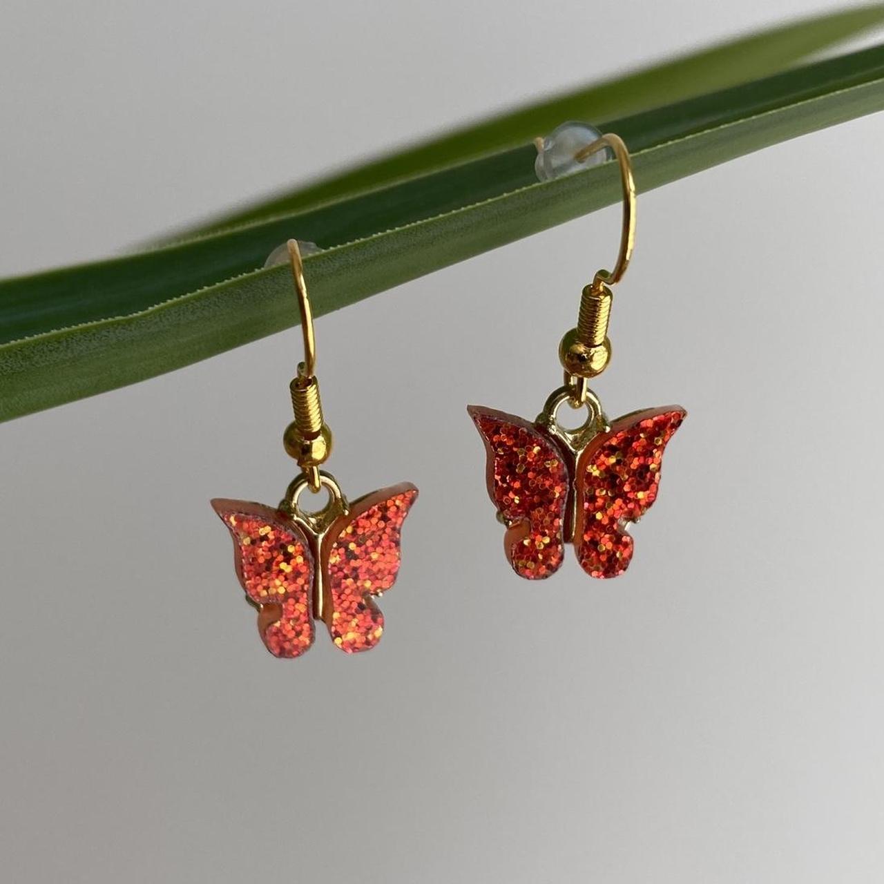 Orange Sparkle Butterfly Dangle Earrings With Gold - Image 2