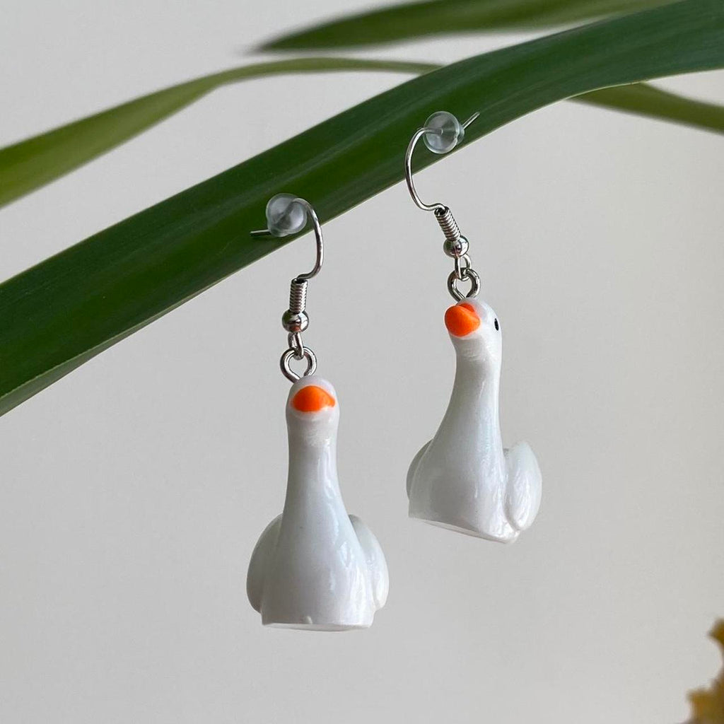 White Goose Dangle Earrings With Silver Accents - Image 2