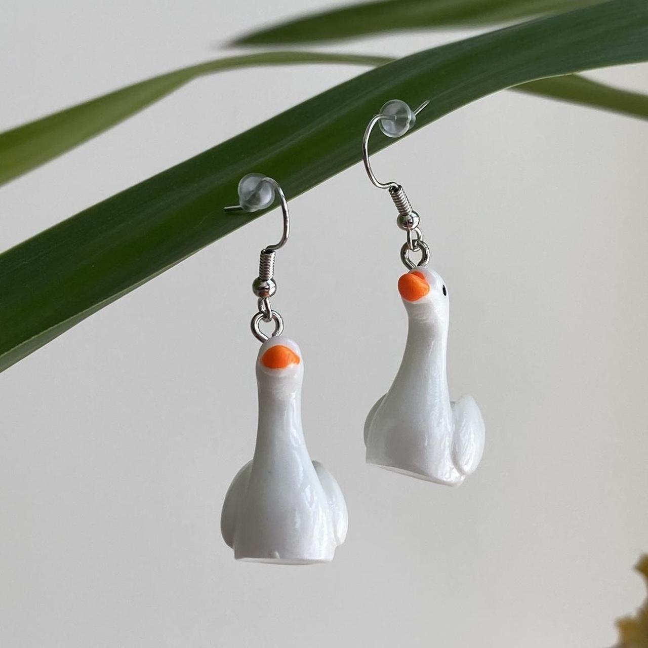 White Goose Dangle Earrings With Silver Accents - Image 2