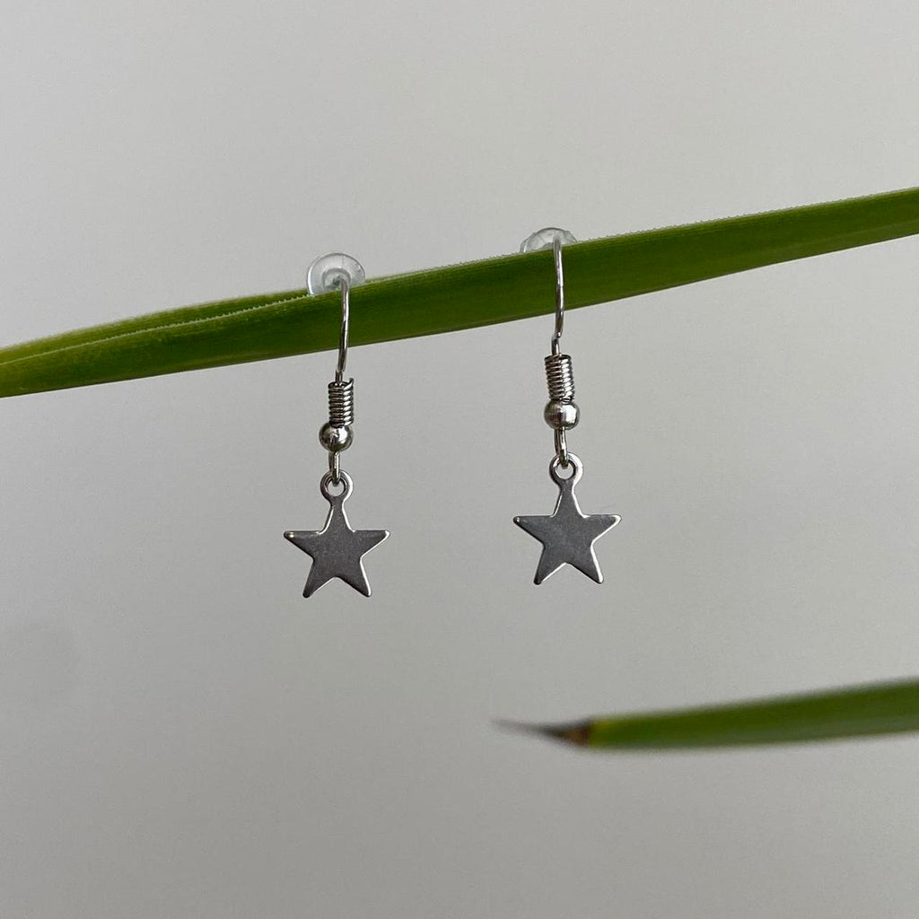 Petite Minimalist Silver Star Dangle Earrings - Image 4